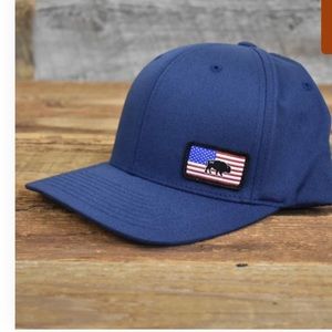 The Bison Union Small "Flag" FlexFit ball cap. Size L/XL Navy blue color.